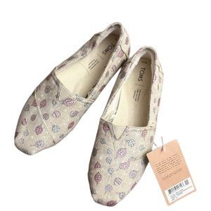 Woman’s Toms Size 10 Natural Sparkle ornaments print woven
